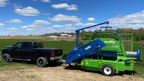 Ag Bag T7170 Transport Mode attached to hitch of truck